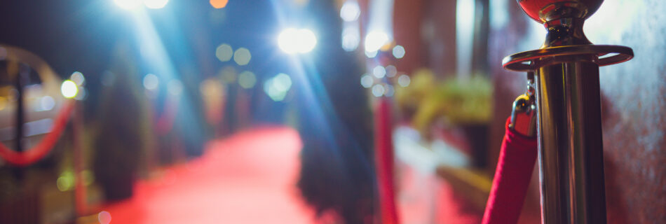 Rope at a red carpet event at night